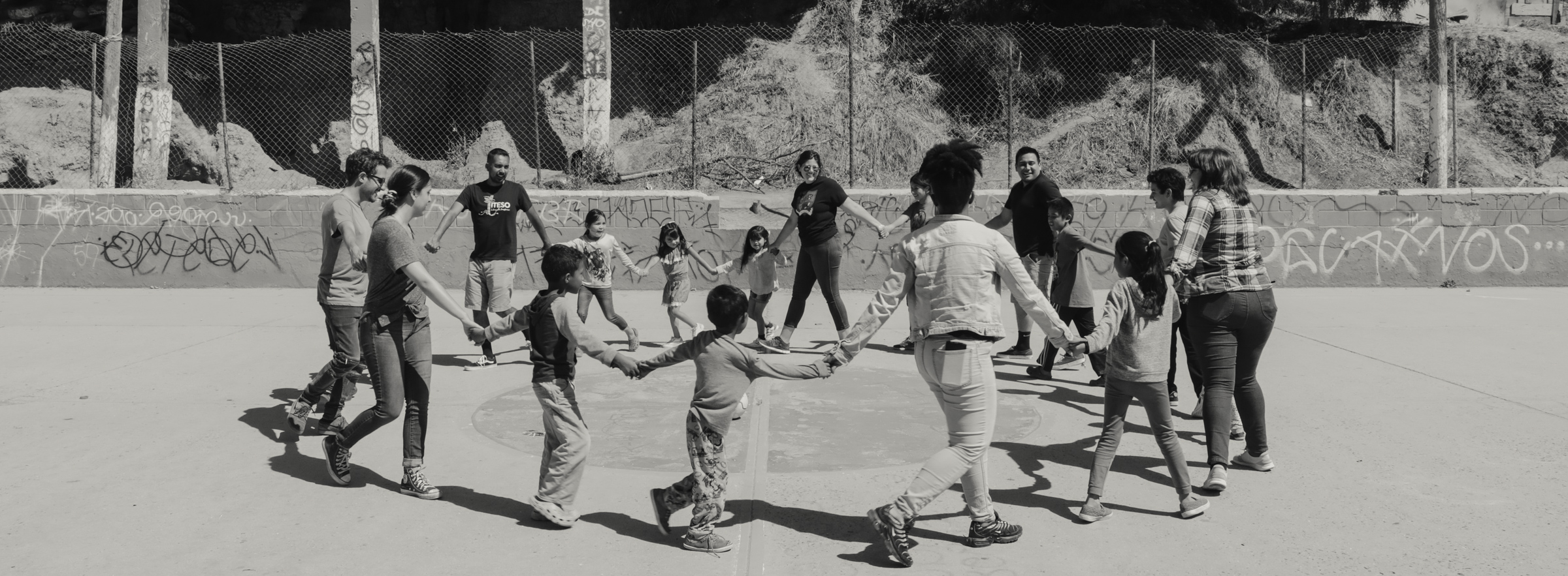 People holding hands in a circle